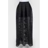 Perforated black maxi skirt