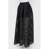 Perforated black maxi skirt