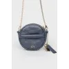 Dark blue small leather bag with golden chains