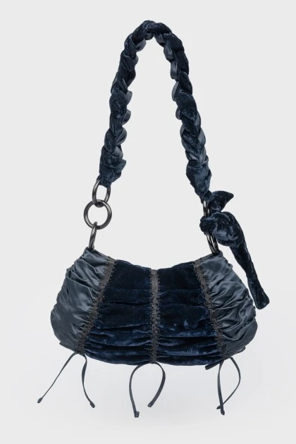 Dark blue textile bag with velvet