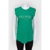 Top green with gold brand logo print