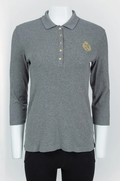 Gray polo with golden buttons