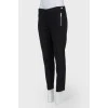 Black trousers with silver fittings