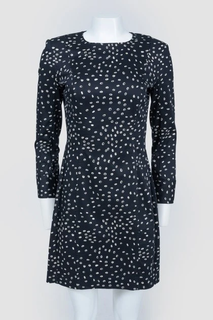 Black dress with white polka dots with a zipper