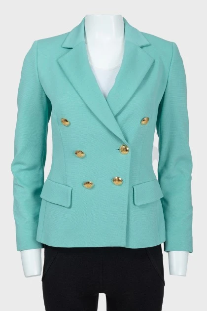 Turquoise jacket with golden buttons