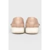 Pink leather slip-ons