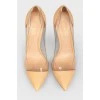 Beige leather pumps with sheer insert