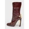 Burgundy patent leather heeled boots