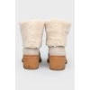 Beige leather boots with fur