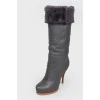 Black leather stiletto heeled boots