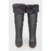 Black leather stiletto heeled boots