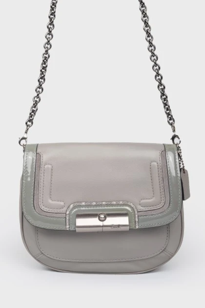 Gray handbag with varnished inserts