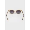 Black sunglasses with golden frame