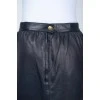 Dark blue leather skirt with golden chain