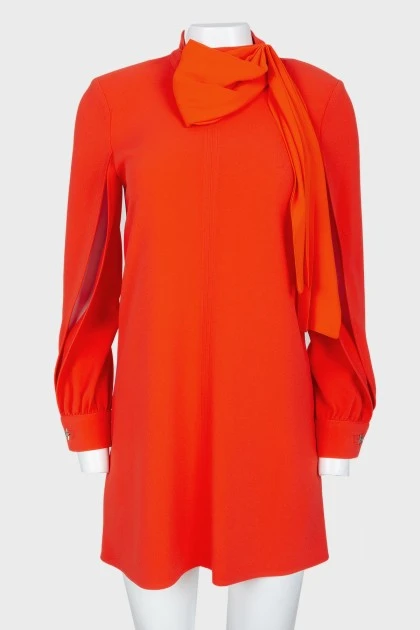 Orange dress with a decorative element