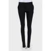 Black trousers with zipper and closure