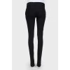 Black trousers with zipper and closure