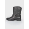 Black leather zipper boots