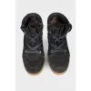 Black suede a hidden wedge heel boots
