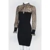Black dress with a leopard print on sleeves