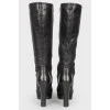 Black leather zipper heel boots