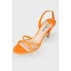 Orange leather stiletto heeled sandals with tag
