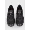 Black leather lace up sneakers