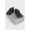 Black leather lace up sneakers