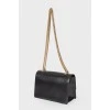 Black handbag on a chain