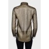 Semi-transparent golden blouse with tag
