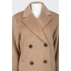 Long wool coat with a tag