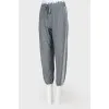 Gray sports trousers with tag