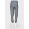 Gray sports trousers with tag