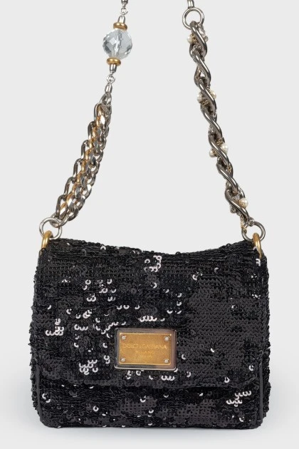 Black handbag in sequins