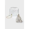 A quilted silver handbag