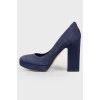 Blue suede shoes with tag