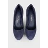Blue suede shoes with tag