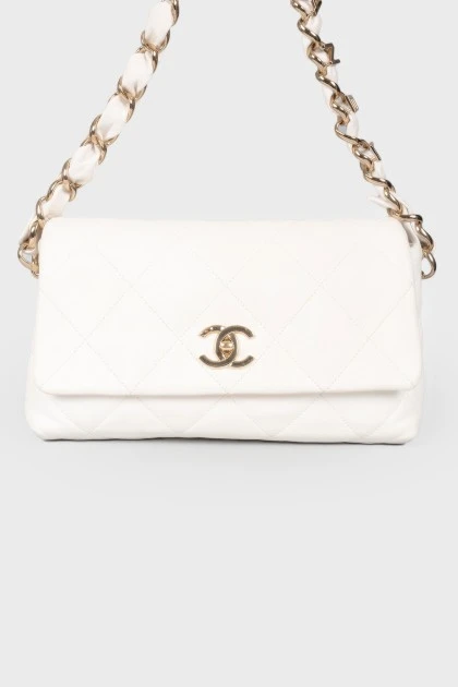 White handbag with a log of brand
