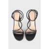 Solid heeled sandals with a tag