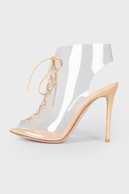 Transparent stiletto heels, with a tag