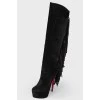 Black suede boots with fringe