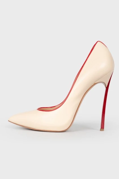 Beige shoes with red contour
