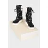 Quilted eco-leather boots with tag