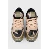 Camouflage-colored sneakers