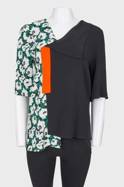 Asymmetric collar and contrasting print top