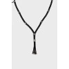 Men's black necklace with tag