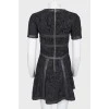 Lace dress with leather inserts