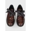 Brown leather brogs on rubber sole