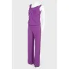 Purple jumpsuit with brooch