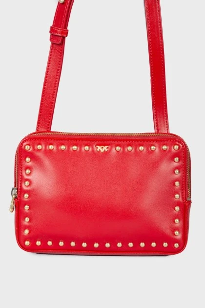 Red bag with gold rivets